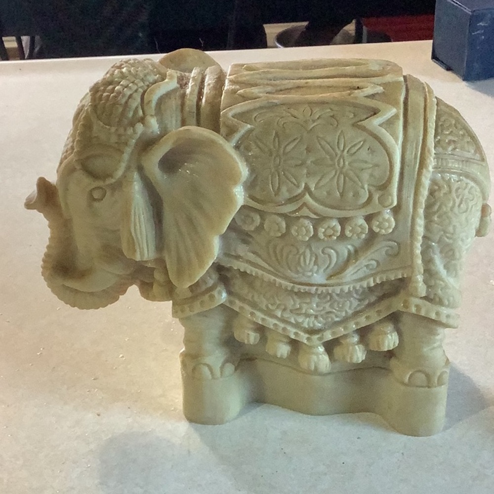 Intricately Carved Tan Elephant Statue